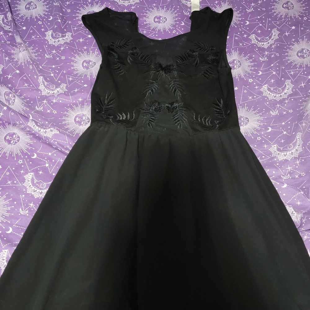 Size 4 black dress.